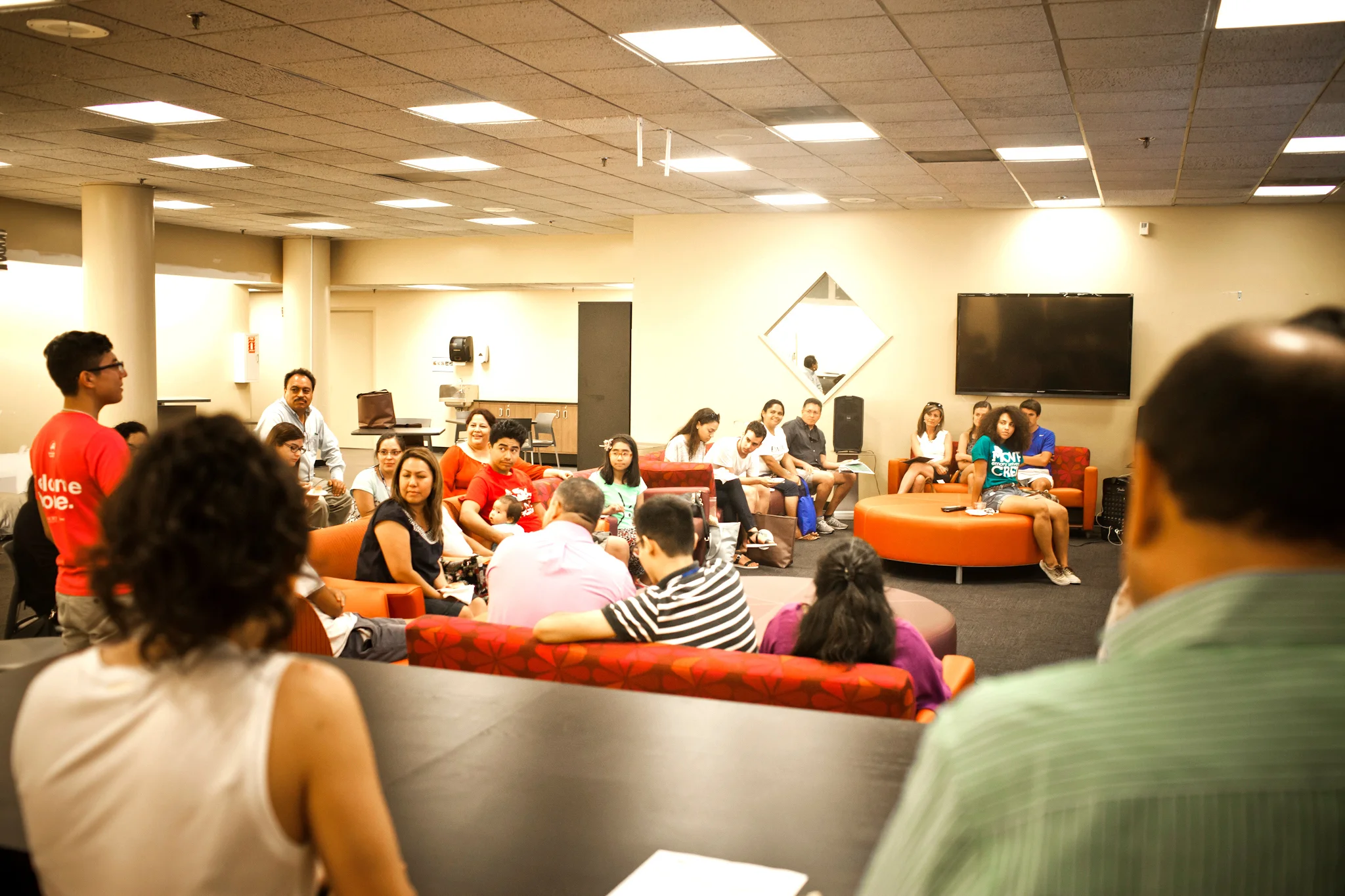 Group of students listening to a speaker